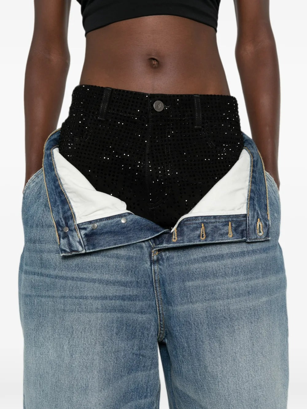 layered jeans and crystal embellishments