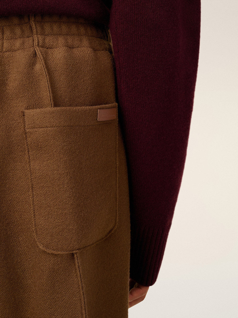 AMI PARIS-Pantaloni elasticizzati in gabardine di lana cotta-