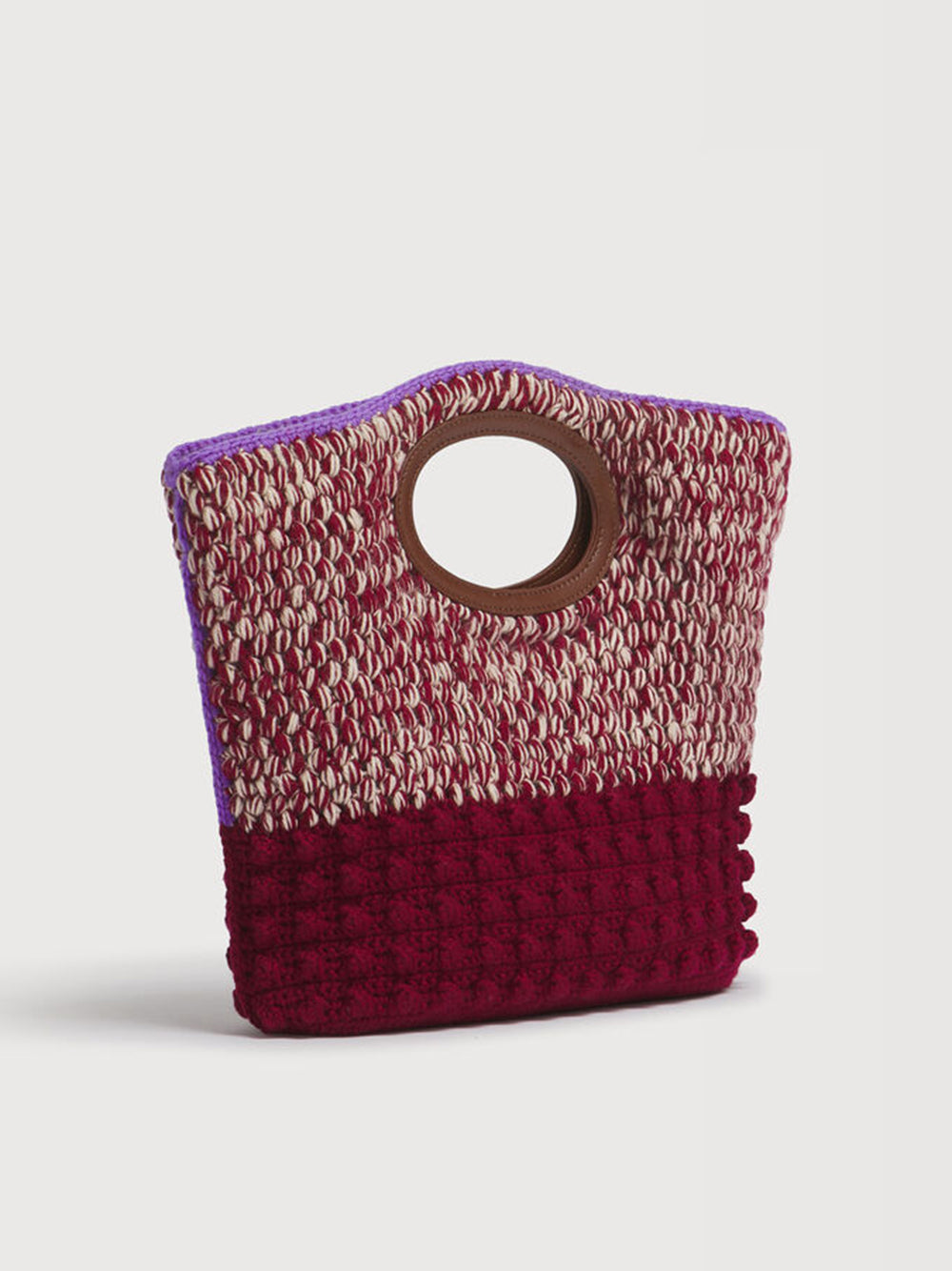 Knotty clutch in red crochet wool